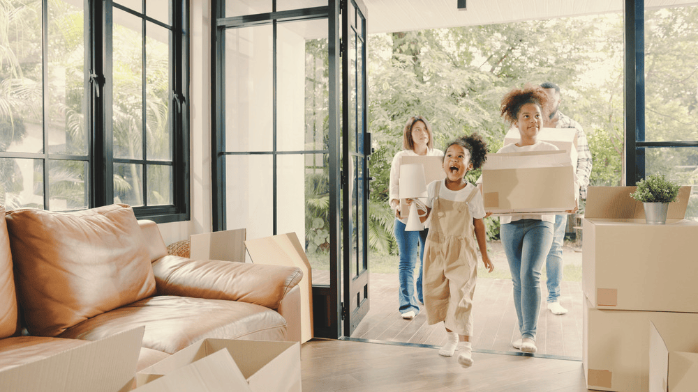 A family moving into their new home