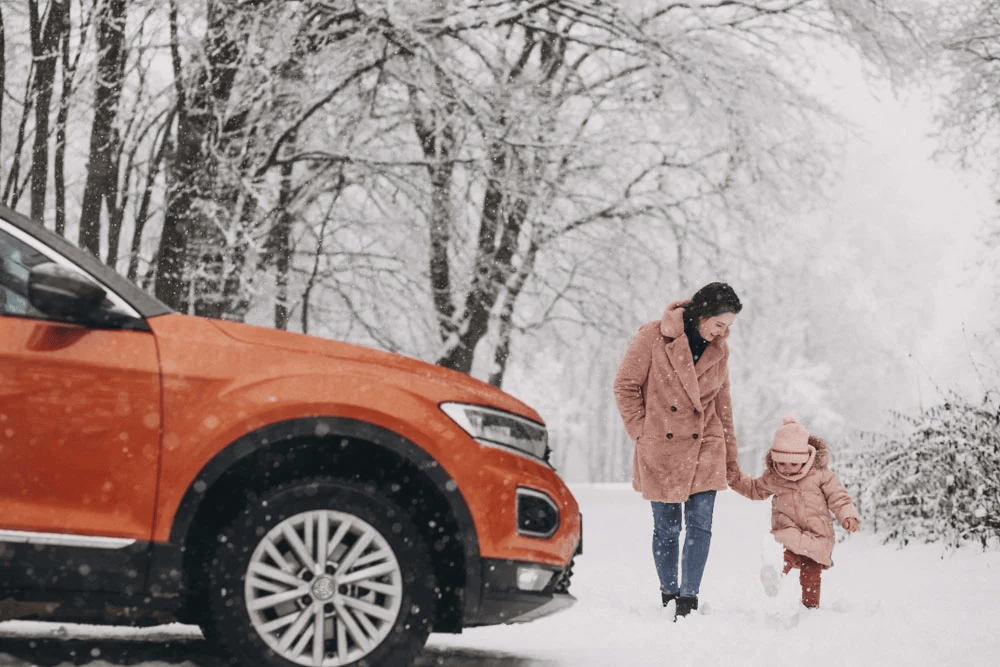 A mother and daughter walk back to their car