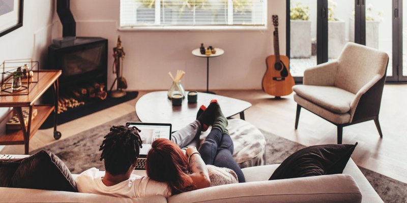 Couple in modern living room at home
